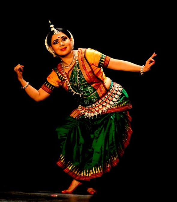 Odissi artist performing on stage